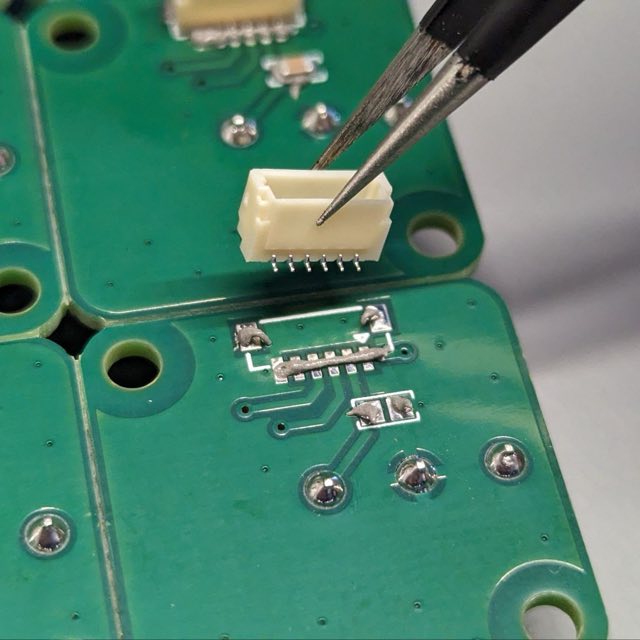 Component placement during prototype assembly at the hardware lab
